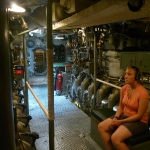 Emily enjoying the audio tour of the USS Bowfin