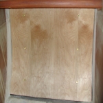 Insulation behind stove