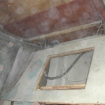 Removing the seat in the main cabin area to get at the aft side of the main bulkhead