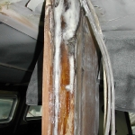 Filler repairs to the teak compression post