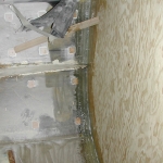 Fiberglass tabbing to connect the new bulkhead to the hull