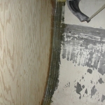 The fiberglass tabbing from the forward side of the bulkhead