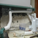 Fitting the discharge plumbing