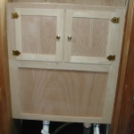 The cabinet doors being test fit