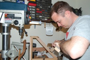 Jed beginning construction of the cabinet frame